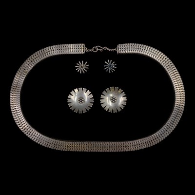 Lot 1308 - A pair of Scottish Modernist silver stud...