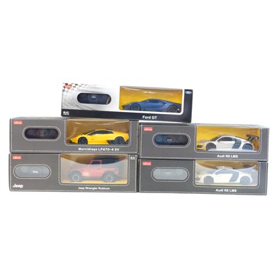 Lot 810 - Five Rastar remote control cars, including...