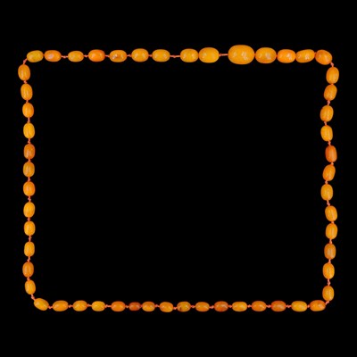 Lot 1501 - A vintage butterscotch amber necklace, of...