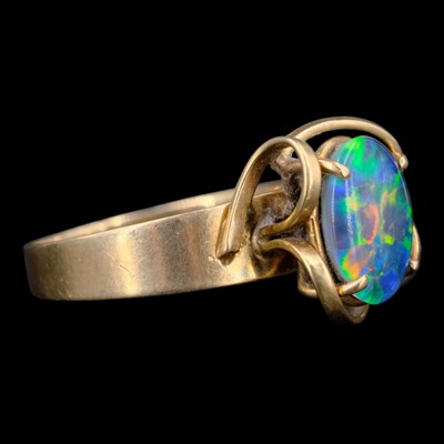 Lot 1408 - A near-contemporary Modernist opal triplet...