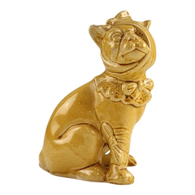 Lot 1031 - An early 20th Century earthenware figure of a...
