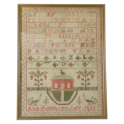 Lot 855 - A George IV needlework alphabet sampler, being...