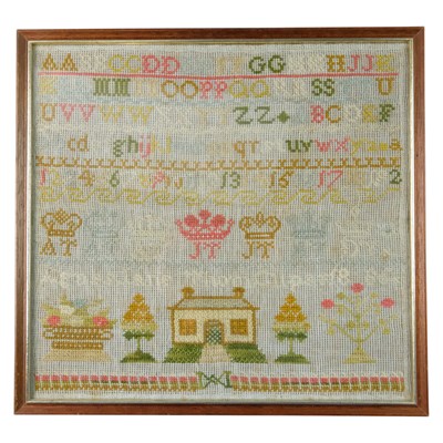 Lot 857 - A Victorian needlework alphabet sampler, being...