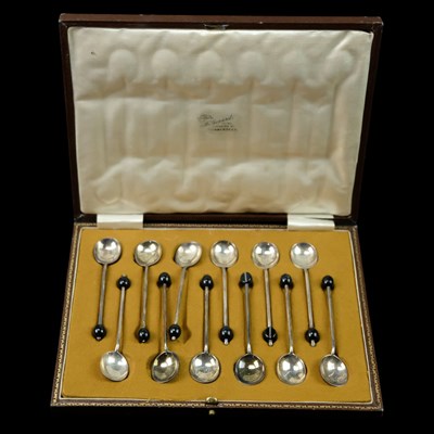 Lot 1204 - A 1920s cased set of twelve silver coffee...