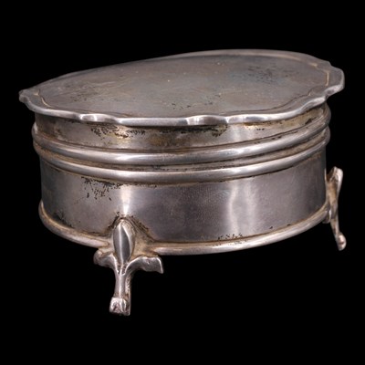 Lot 1220 - A 1920s silver drum-form trinket box, its...