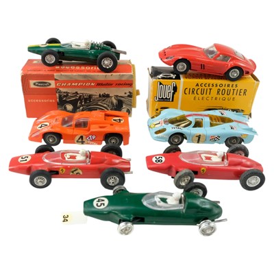 Lot 805 - A group of Playcraft and Jouef slot cars,...