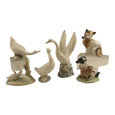 Lot 1036 - A group of Nao porcelain animal figurines,...