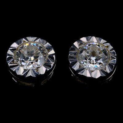 Lot 1516 - A pair of diamond and 9 ct white-gold stud...
