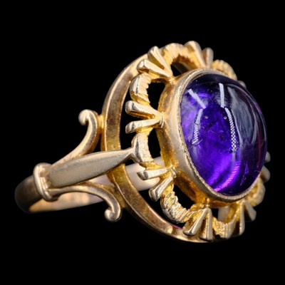 Lot 1518 - A 1970s amethyst cocktail ring, comprising an...