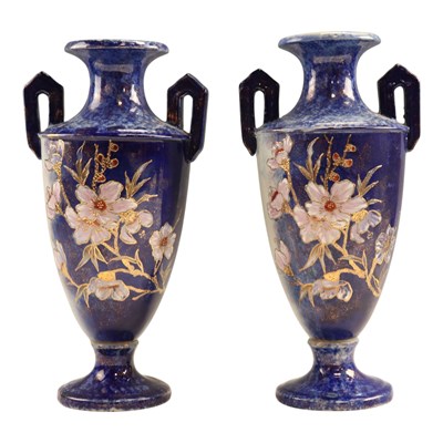 Lot 990 - A pair of Rathbone and Co flow blue pottery...