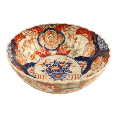 Lot 950 - A large Japanese Imari porcelain punch or...