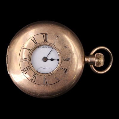 Lot 1604 - An early 20th Century Waltham gold-plated half-...