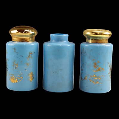 Lot 1106 - Three Victorian pharmacist's blue opaline...