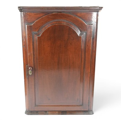 Lot 1685 - A George III mahogany hanging corner cabinet,...