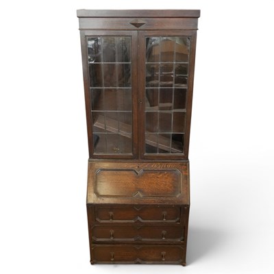 Lot 1711 - A George V Jacodean Revival oak bureau...