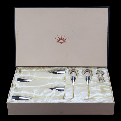 Lot 1171 - A cased Art Deco silver three-piece dressing...