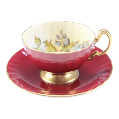 Lot 1005 - An Aynsley "Cabbage Rose" burgundy teacup and...