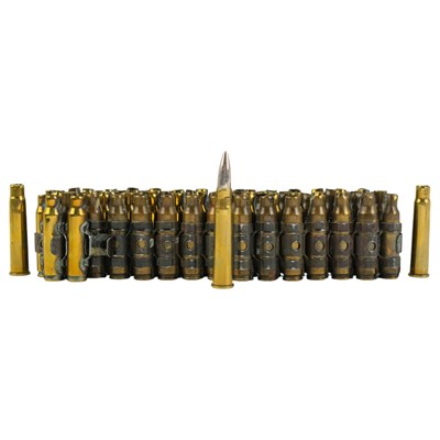 Lot 218 - A belt of British military L13A1 7.62 mm...