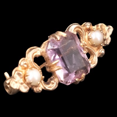 Lot 1289 - A 1970s amethyst-coloured paste, pearl and 9...