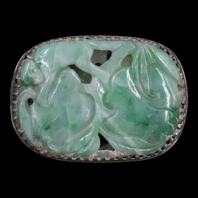 Lot 1189 - A Chinese white metal-mounted jade...