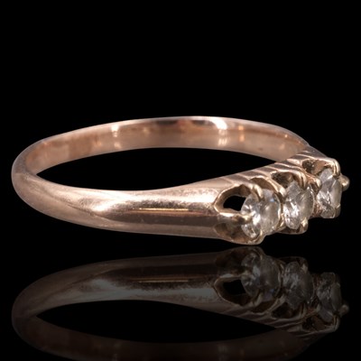 Lot 1259 - A three-stone diamond ring, comprising a trio...