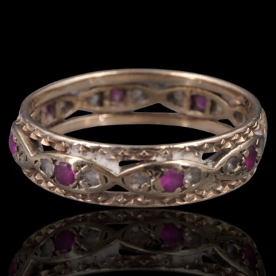 Lot 1261 - A 1970s ruby, white gemstone and 9 ct gold...
