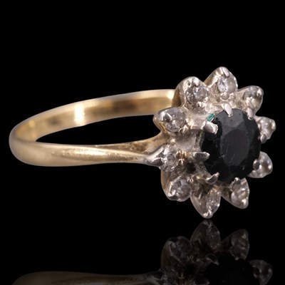 Lot 1266 - A 1960s sapphire and diamond cluster...
