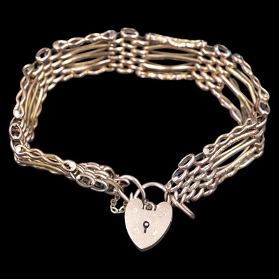 Lot 1270 - A 1990s 9 ct gold fancy gate-link bracelet, of...