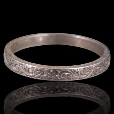 Lot 1279 - A vintage precious white metal ring, of...