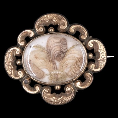 Lot 1248 - A Victorian gold mourning brooch, comprising...