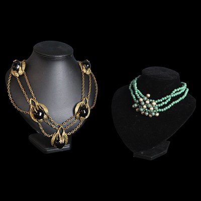 Lot 1418 - A mid-Century French faux-onyx and gilt metal...