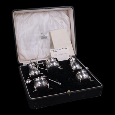 Lot 1100 - A George V silver cruet set, comprising...