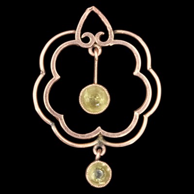 Lot 1281 - An early 20th Century peridot and 9 ct...