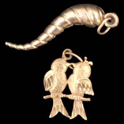 Lot 1283 - 9 ct yellow metal cornucopia and "lovebirds"...