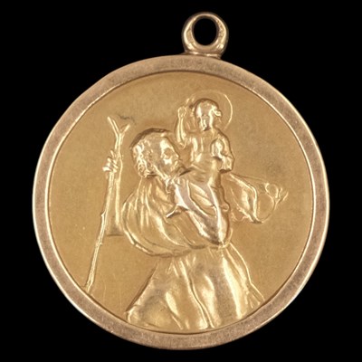 Lot 1343 - A 9 ct yellow metal St Christopher...