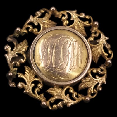 Lot 1345 - A Victorian gold brooch, comprising a circular...