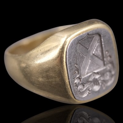 Lot 1350 - An antique high-carat gold signet ring, its...