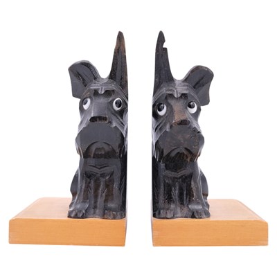 Lot 894 - A pair of carved-treen whimsical bookends in...