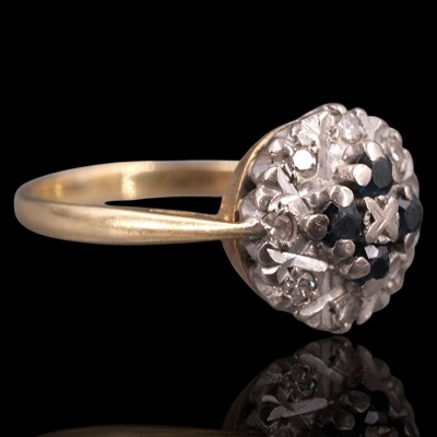 Lot 1303 - A 1960s sapphire and diamond cluster...