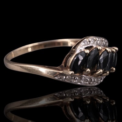 Lot 1307 - A contemporary sapphire and diamond...