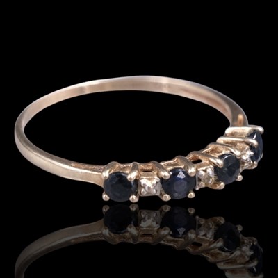 Lot 1308 - A near-contemporary sapphire and diamond...
