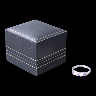 Lot 1310 - A contemporary five-stone amethyst and cubic...
