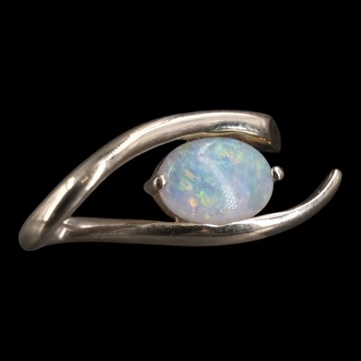 Lot 1315 - A contemporary opal and 18 ct yellow metal...