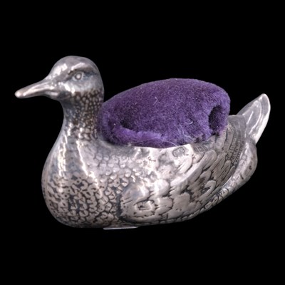 Lot 1066 - An Edwardian silver pin cushion in the form of...