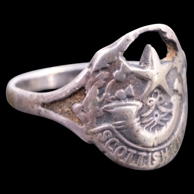 Lot 37 - A Cameronians (Scottish Rifles) white metal...