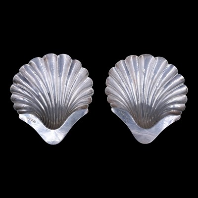 Lot 1071 - A pair of Victorian silver butter shells,...