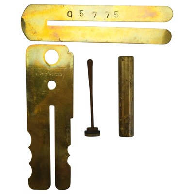 Lot 193 - A Great War brass button stick, together with...