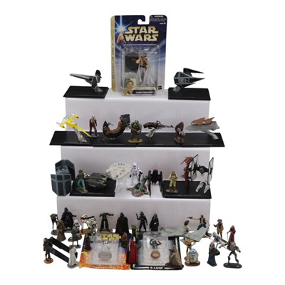 Lot 695 - A group of diecast and other Star Wars action...