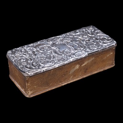 Lot 1125 - A late-Victorian silver-topped leather trinket...