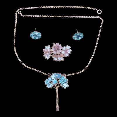 Lot 1199 - Vintage pink and blue enamelled silver / white...